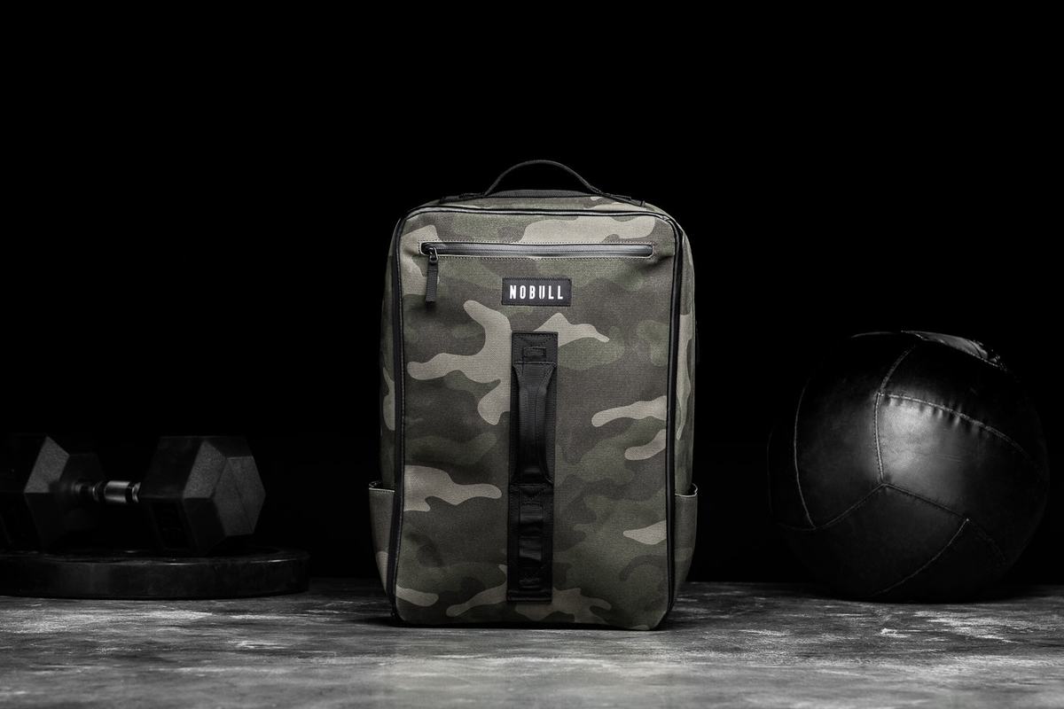 Green Camo Men\'s Nobull Waxed Canvas Backpacks | USA827045